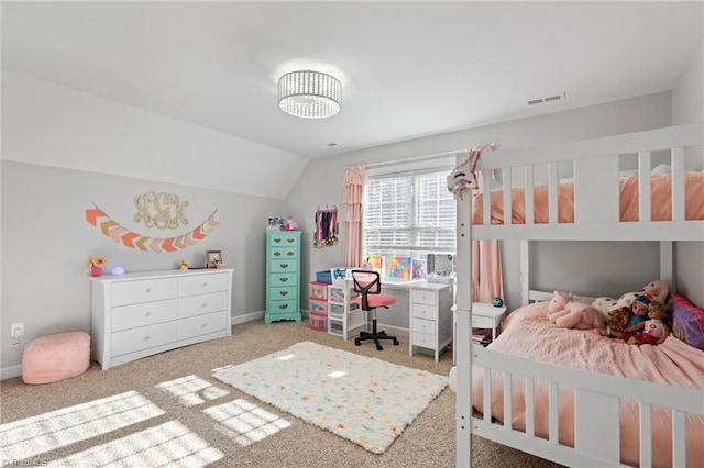 bedroom featuring light carpet and vaulted ceiling