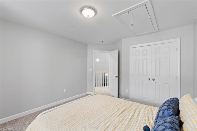 carpeted bedroom with a closet