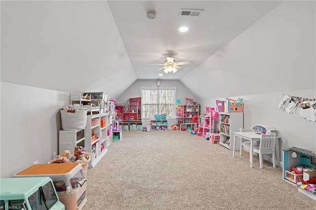 rec room with carpet flooring, ceiling fan, and lofted ceiling