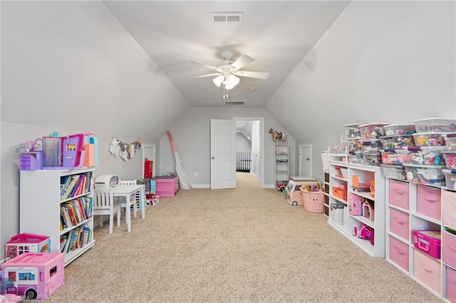 playroom with ceiling fan, lofted ceiling, and carpet floors