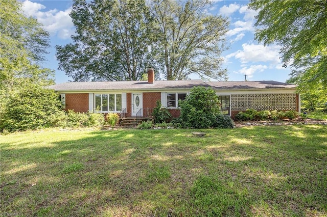 610 Frye Bridge Rd, Clemmons, NC 27012 - ranch-style house featuring brick siding, a front lawn, and a chimney