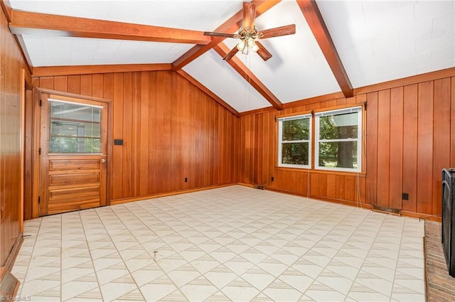 610 Frye Bridge Rd, Clemmons, NC 27012 - unfurnished living room featuring a ceiling fan and wood walls