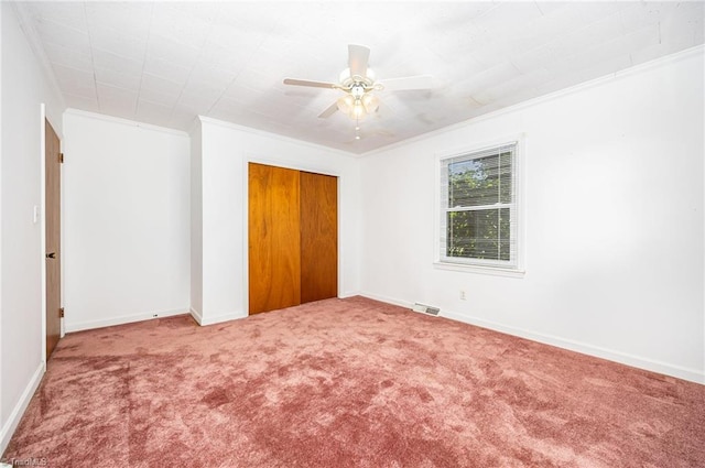 610 Frye Bridge Rd, Clemmons, NC 27012 - unfurnished bedroom featuring ornamental molding, carpet flooring, a closet, and ceiling fan