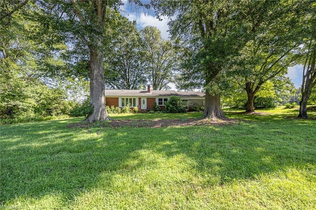 610 Frye Bridge Rd, Clemmons, NC 27012 - ranch-style house with a front lawn and a chimney