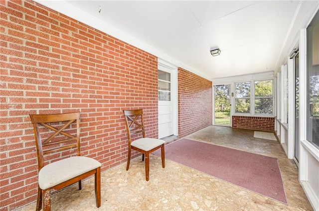 610 Frye Bridge Rd, Clemmons, NC 27012 - unfurnished sunroom with brick wall