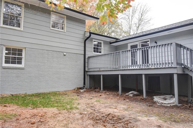 exterior space featuring a wooden deck