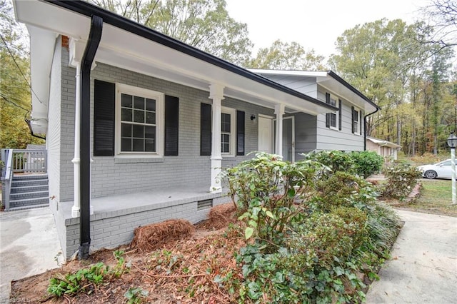 view of front of home featuring covered porch