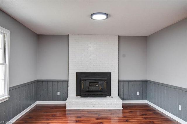 1638 Colonial Dr, Salisbury, NC 28144 - detailed view of wood finished floors, a wainscoted wall, and baseboards