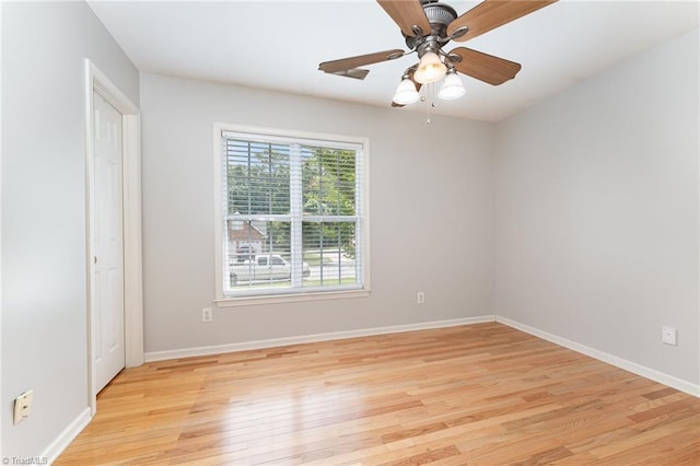 5921 Election Oak Dr, High Point, NC 27265 - unfurnished room with light wood-type flooring, ceiling fan, and baseboards