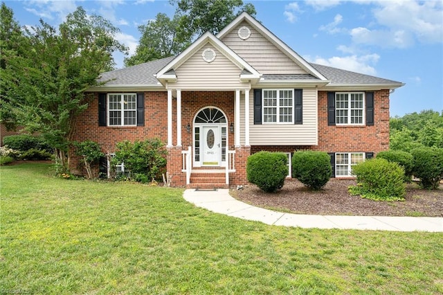 5921 Election Oak Dr, High Point, NC 27265 - raised ranch with a front yard and brick siding