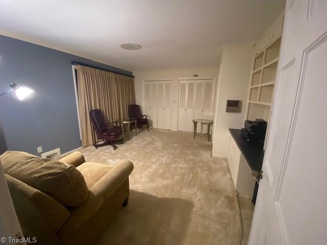 living room with light carpet