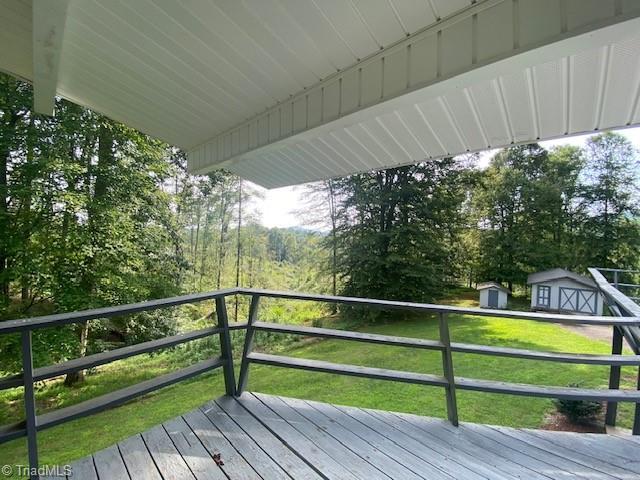 deck with a shed