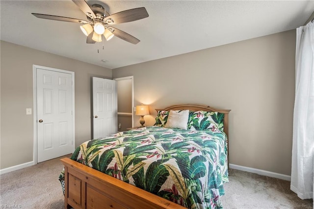 7145 Franklin Rd, Lewisville, NC 27023 - carpeted bedroom featuring baseboards and a ceiling fan