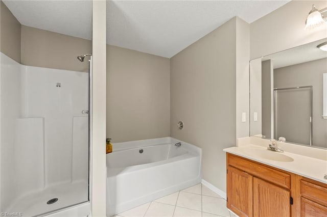 7145 Franklin Rd, Lewisville, NC 27023 - full bath featuring tile patterned flooring, a bath, vanity, a stall shower, and a textured ceiling