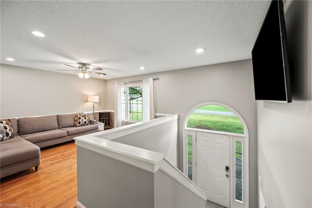 7145 Franklin Rd, Lewisville, NC 27023 - living area with a textured ceiling, recessed lighting, light wood-type flooring, and ceiling fan