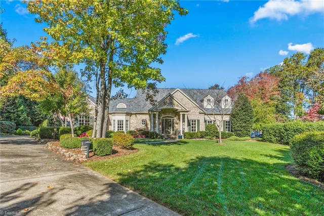 view of front of house with a front lawn