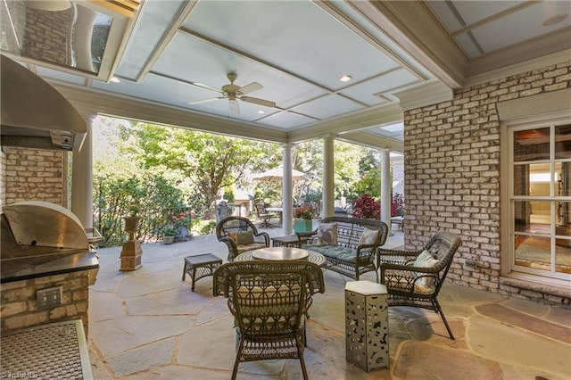 view of patio featuring ceiling fan, an outdoor kitchen, and outdoor lounge area