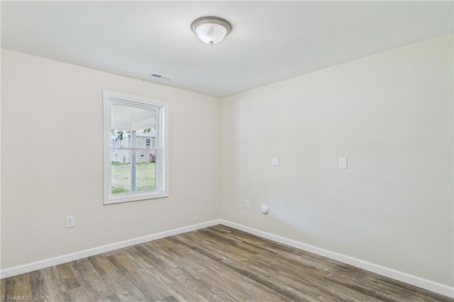 3885 Leo St, Winston-Salem, NC 27105 - spare room with wood finished floors and baseboards