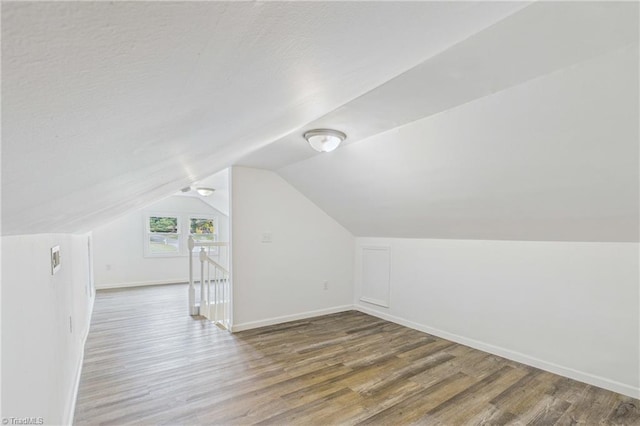 3885 Leo St, Winston-Salem, NC 27105 - bonus room with wood finished floors and vaulted ceiling