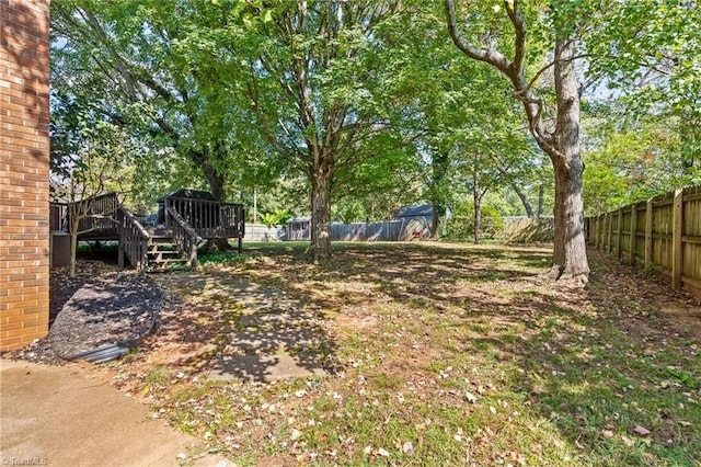 view of yard featuring a deck