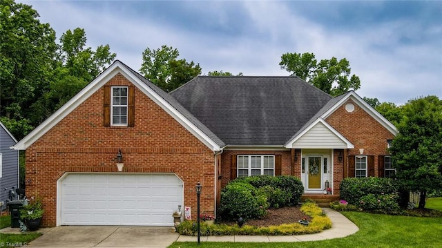 5110 Hartridge Way, Greensboro, NC 27407 - traditional-style house with brick siding, concrete driveway, an attached garage, a front yard, and a shingled roof