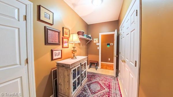 5110 Hartridge Way, Greensboro, NC 27407 - doorway featuring baseboards