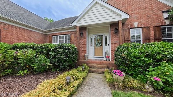 5110 Hartridge Way, Greensboro, NC 27407 - view of exterior entry with brick siding