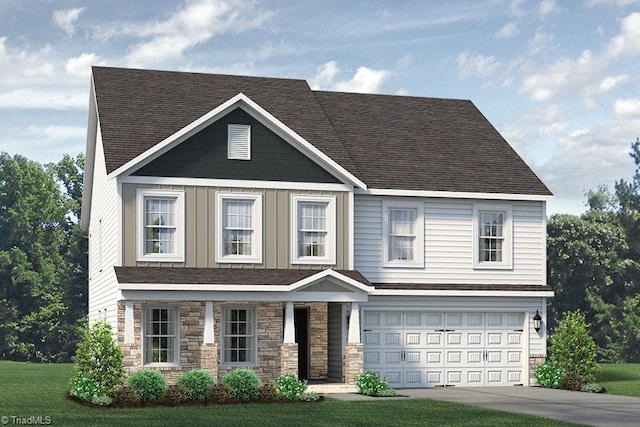 view of front of home featuring a garage and a front yard