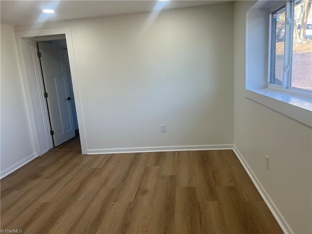 empty room featuring hardwood / wood-style floors