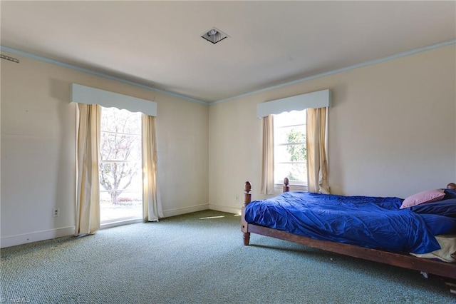 bedroom featuring light colored carpet and ornamental molding