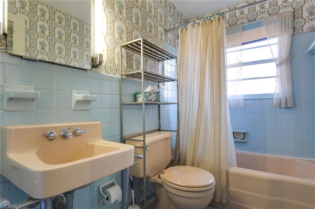 full bathroom with shower / tub combo, tasteful backsplash, toilet, and tile walls