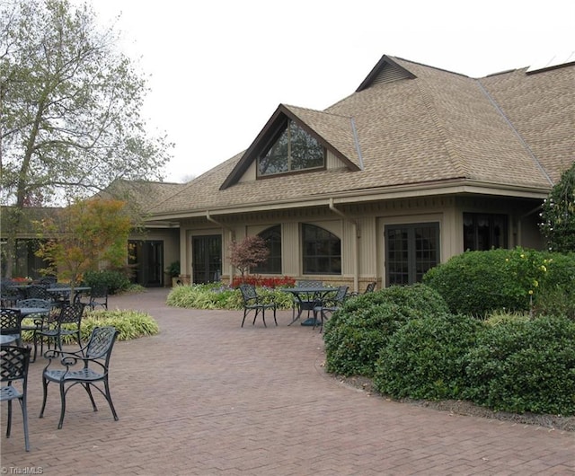 back of property featuring a patio area