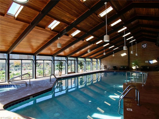 view of pool featuring a skylight