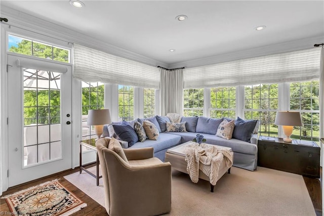 sunroom featuring crown molding, recessed lighting, french doors, and wood finished floors
