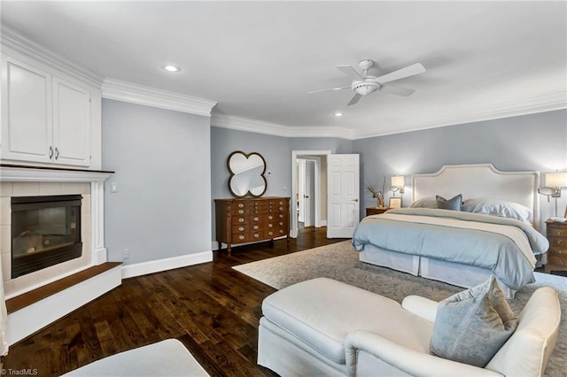 bedroom with recessed lighting, baseboards, ornamental molding, and wood finished floors