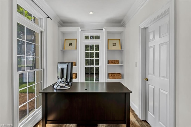 home office with baseboards, plenty of natural light, ornamental molding, and dark wood finished floors