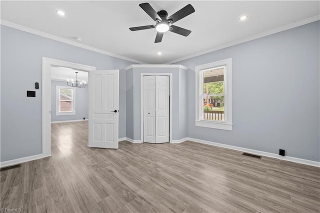308 Worrell St, Thomasville, NC 27360 - unfurnished bedroom with a chandelier, wood finished floors, ornamental molding, recessed lighting, and a ceiling fan