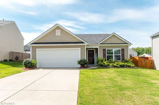 view of front of home with an attached garage and driveway