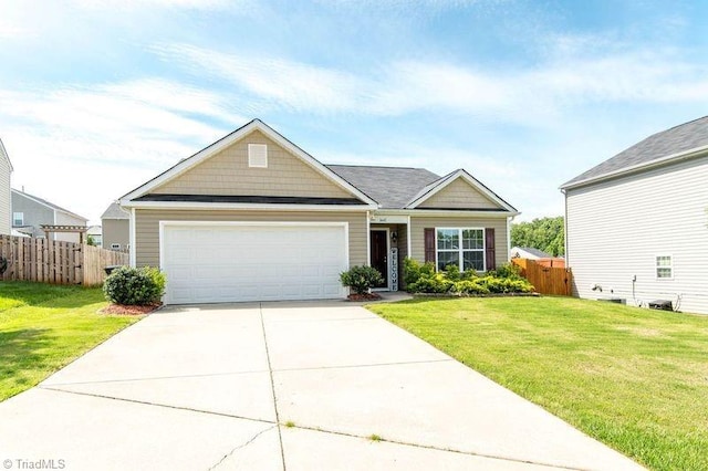 view of front of home featuring an attached garage and driveway
