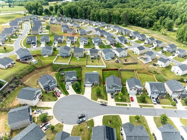 aerial view of property's location with nearby suburban area