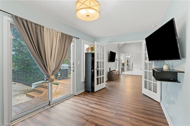 living room featuring hardwood / wood-style floors and french doors