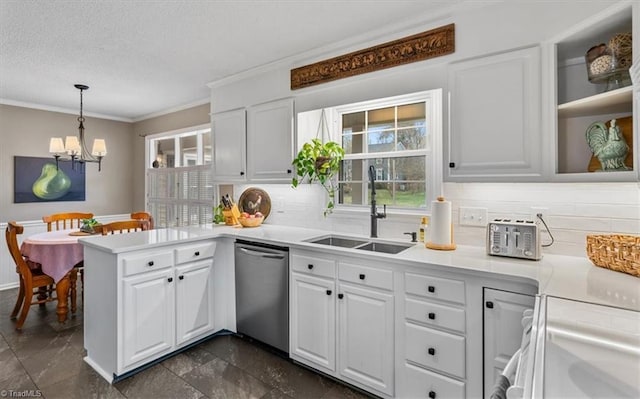 kitchen featuring a sink, stainless steel dishwasher, white cabinetry, a peninsula, and crown molding