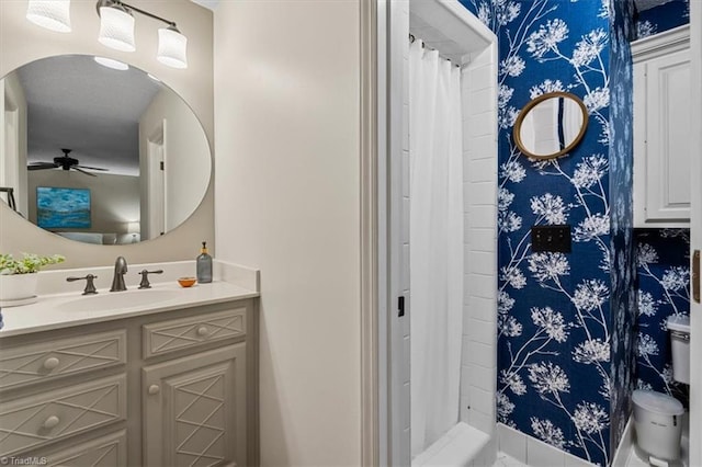 bathroom featuring vanity, a shower with curtain, and a ceiling fan