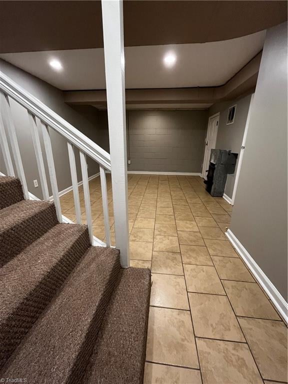 interior space featuring light tile patterned floors