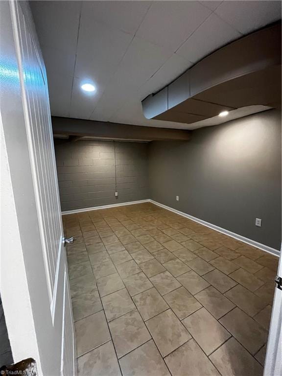 basement with light tile patterned floors