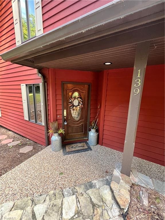 doorway to property with a porch