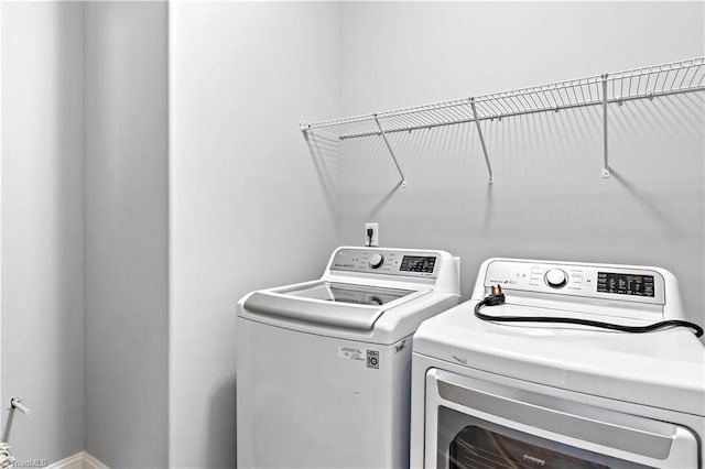 laundry area featuring separate washer and dryer