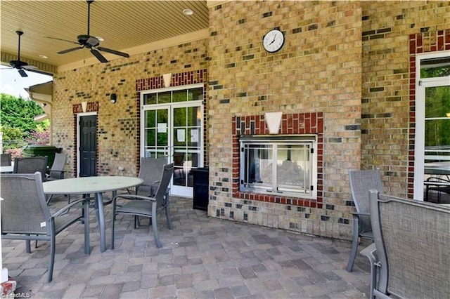 view of patio featuring ceiling fan