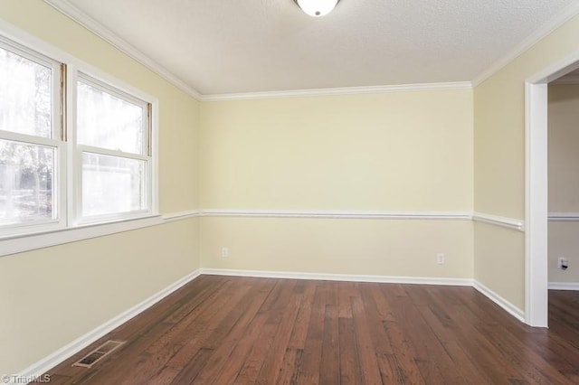 unfurnished room featuring crown molding and dark hardwood / wood-style floors