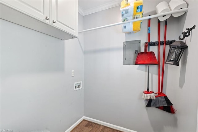 5215 Hicone Rd, Mcleansville, NC 27301 - washroom with cabinet space, crown molding, wood finished floors, baseboards, and electric panel